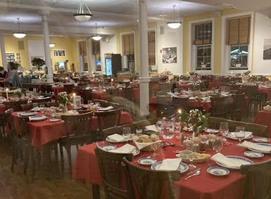 The dining hall set for the winter holiday dinner.